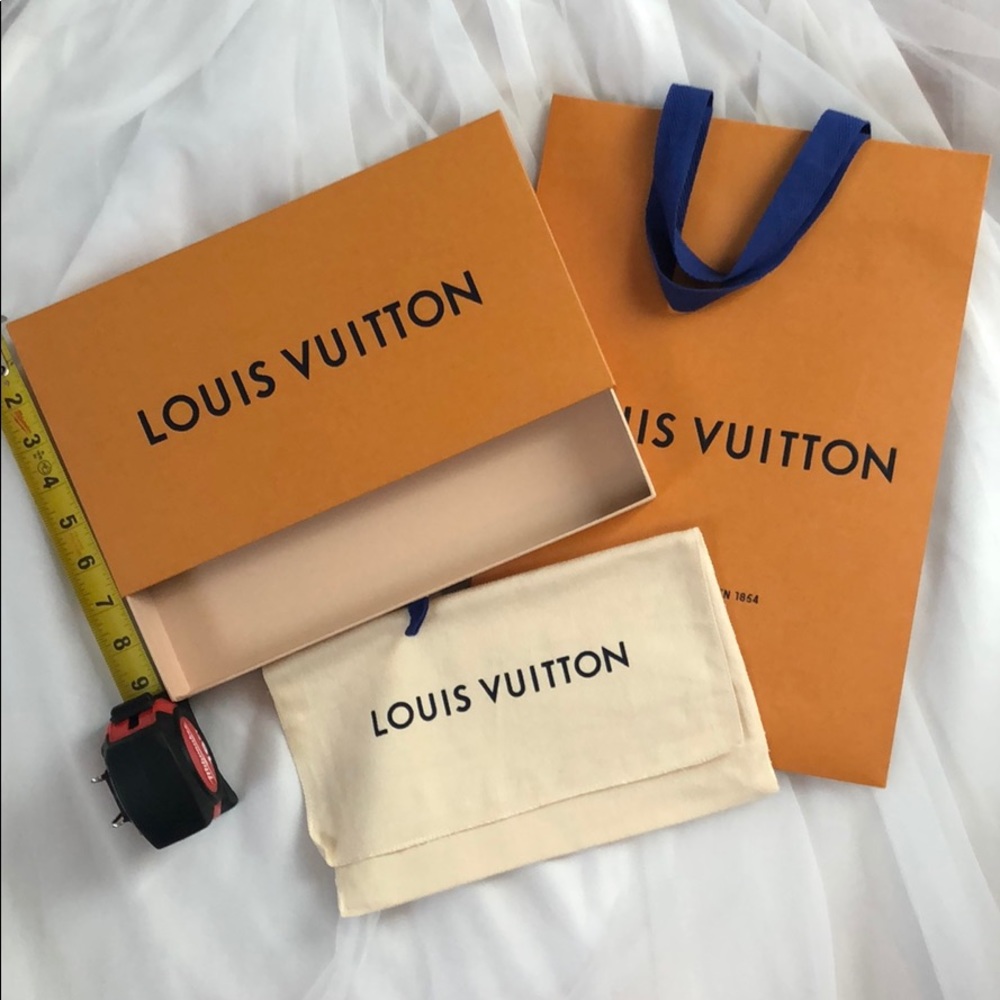 Louis Vuitton box, duster, and bag
